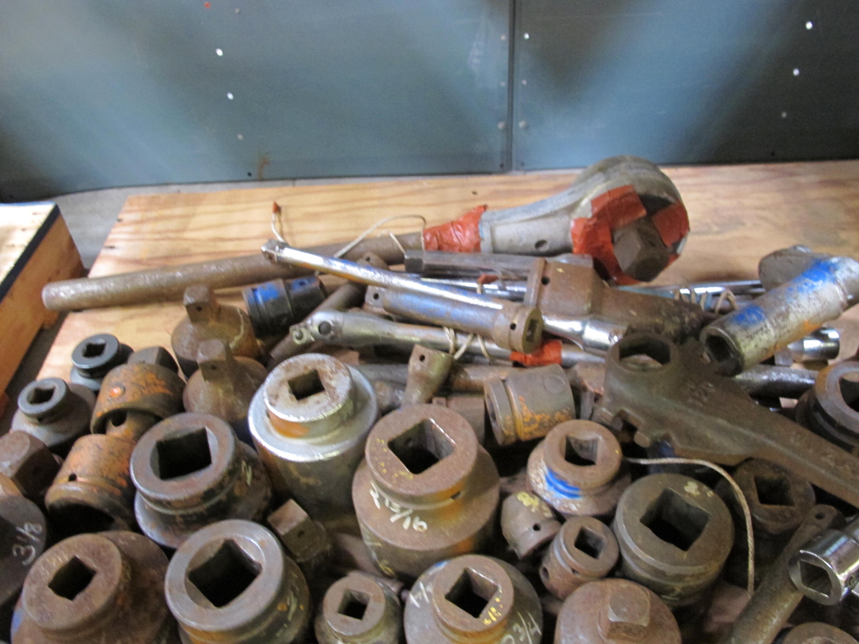 MISC SOCKETS, ADAPTERS, BREAKER BARS, EXTENSION, AND A LARGE RATCHET. LOADING & HANDLING FEE $15-4009